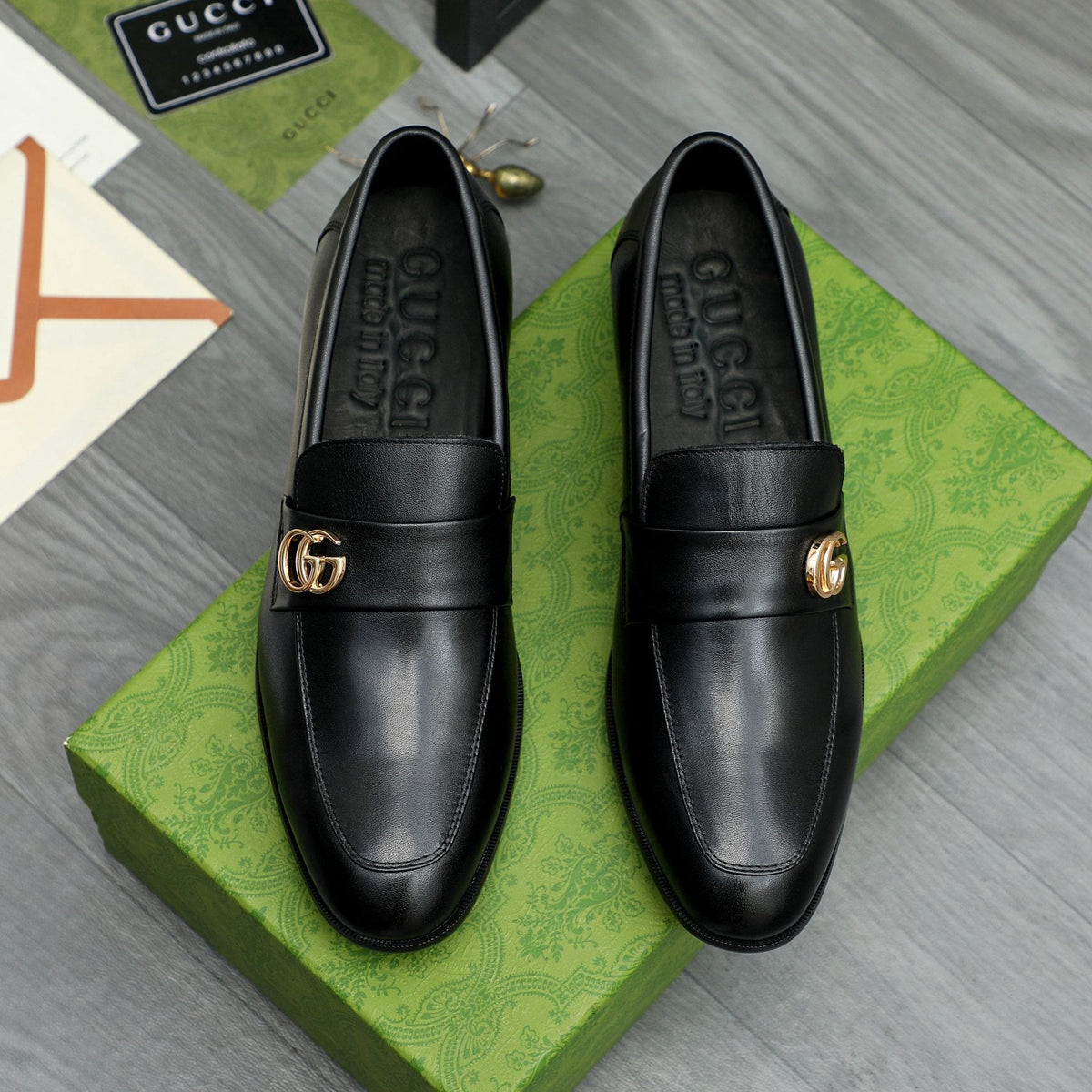 Gucci Black Loafers with Gold-Tone Hardware — front