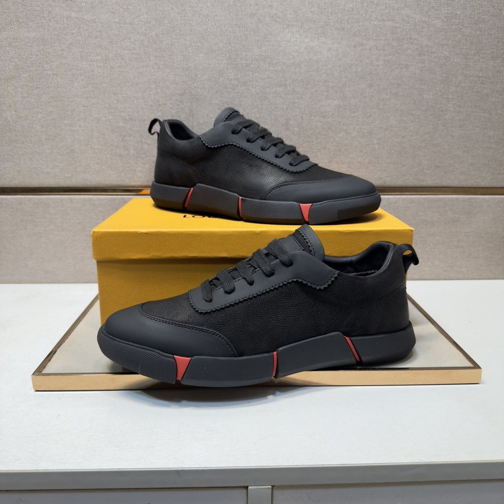 Louis Vuitton Black Low-Top Sneakers with Red Accents — front