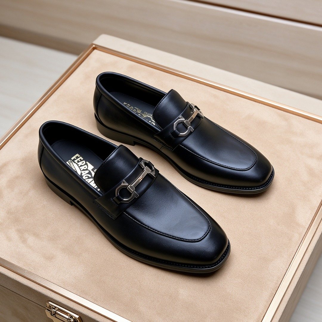 Ferragamo Black Bit Loafers — front