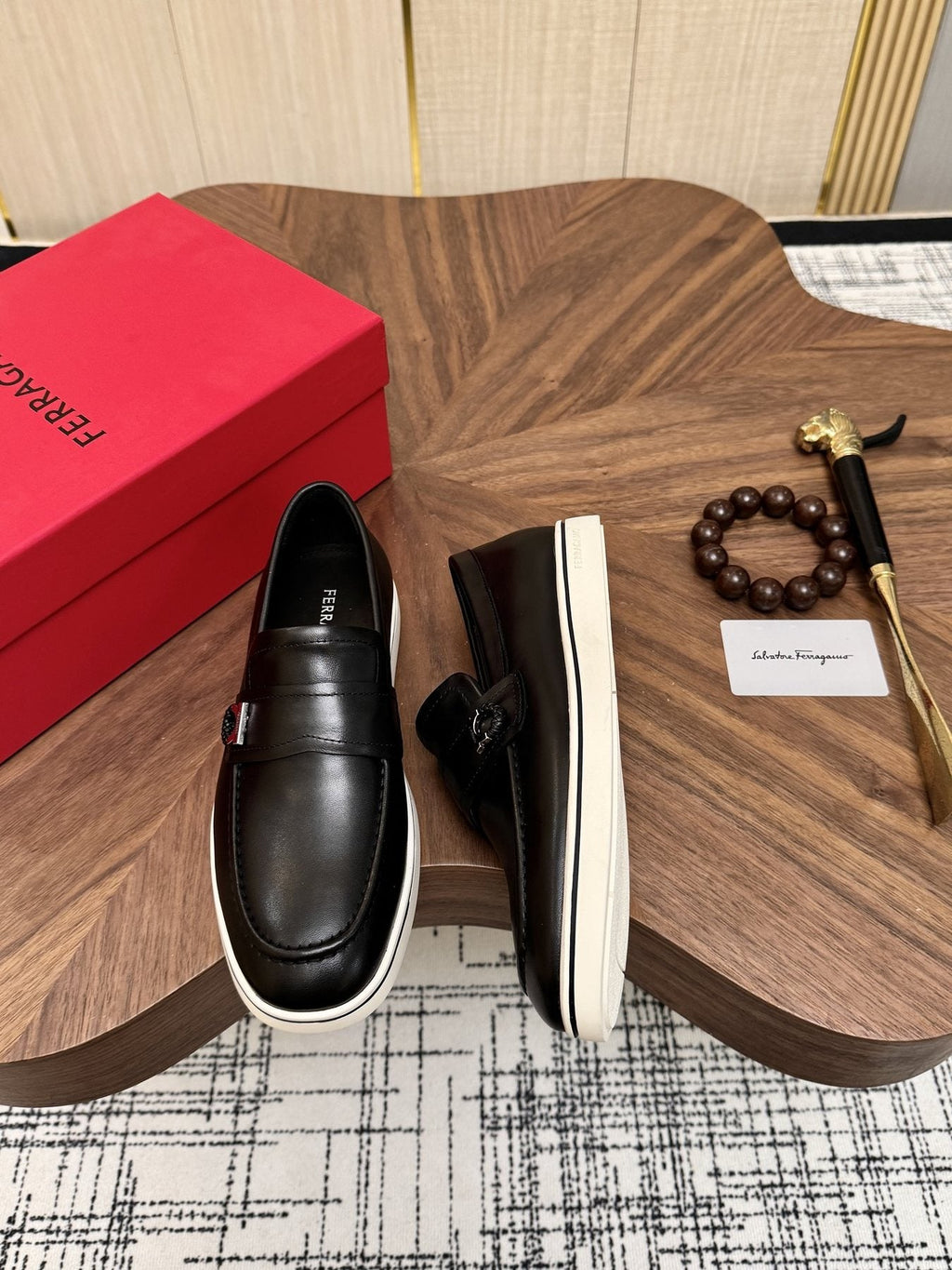 Salvatore Ferragamo Black Loafers with White Soles — side