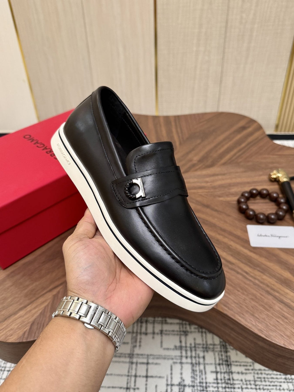 Salvatore Ferragamo Black Loafers with White Soles — model