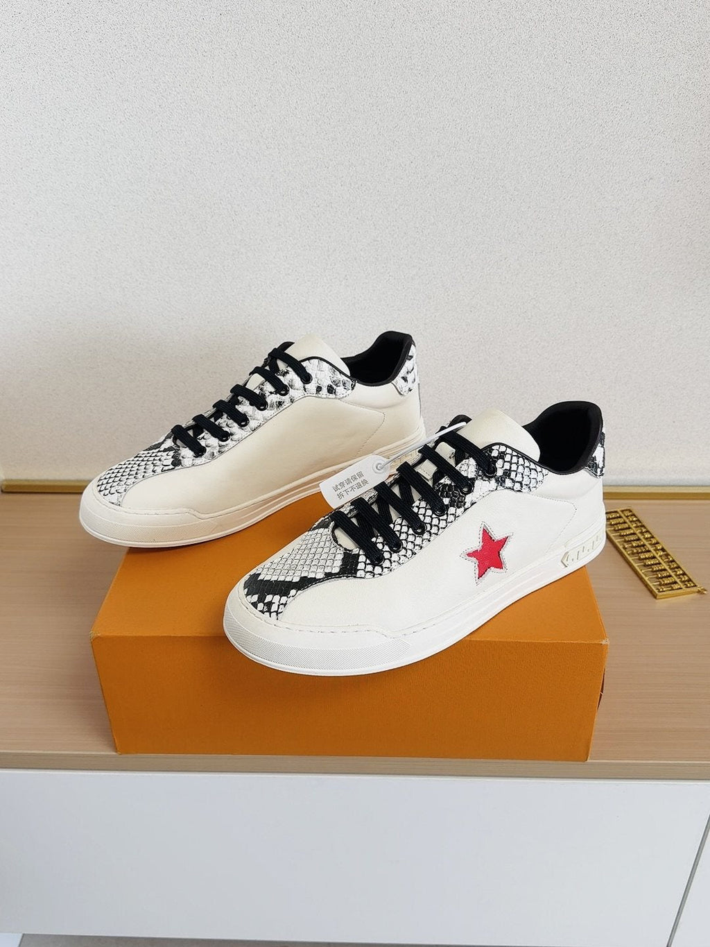 Louis Vuitton Red Star Low-Top Sneakers — front