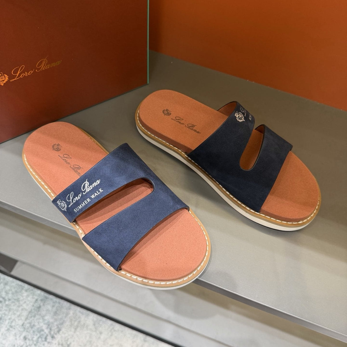Loro Piana Navy Cutout Slide Sandals — front