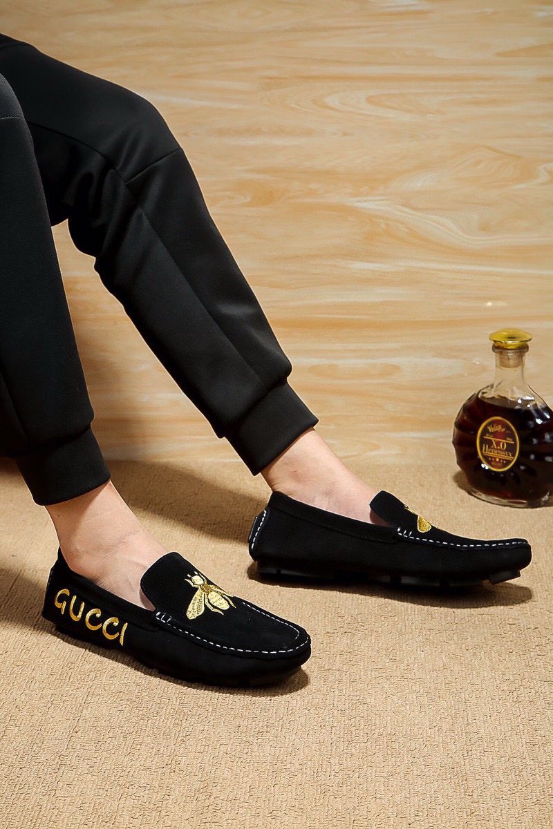 Gucci Black Loafers with Gold Bee Motifs — model