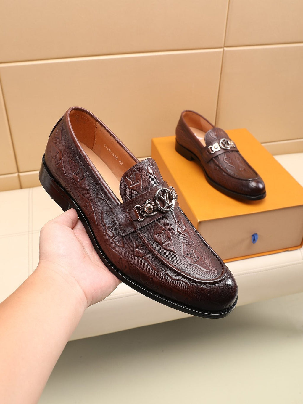 Louis Vuitton Dark Brown Embossed Loafers — model