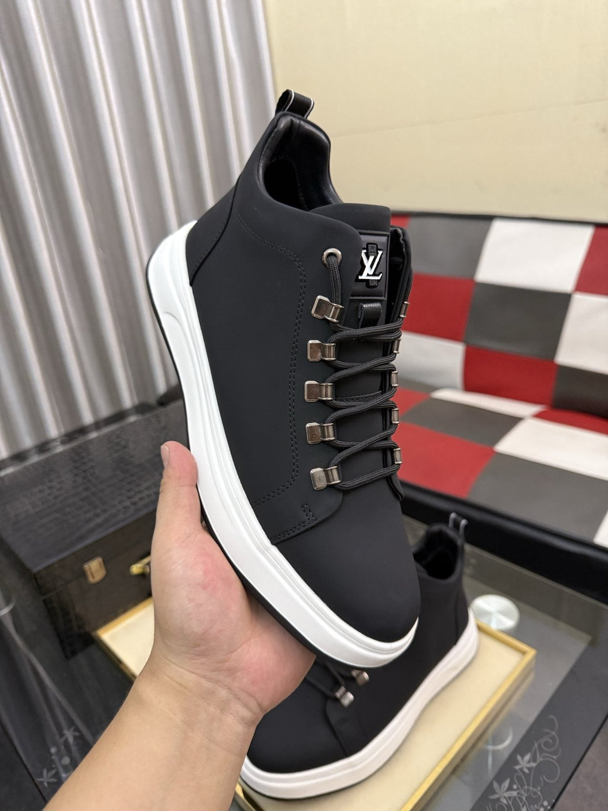 Louis Vuitton Lace-Up High-Top Sneakers — model