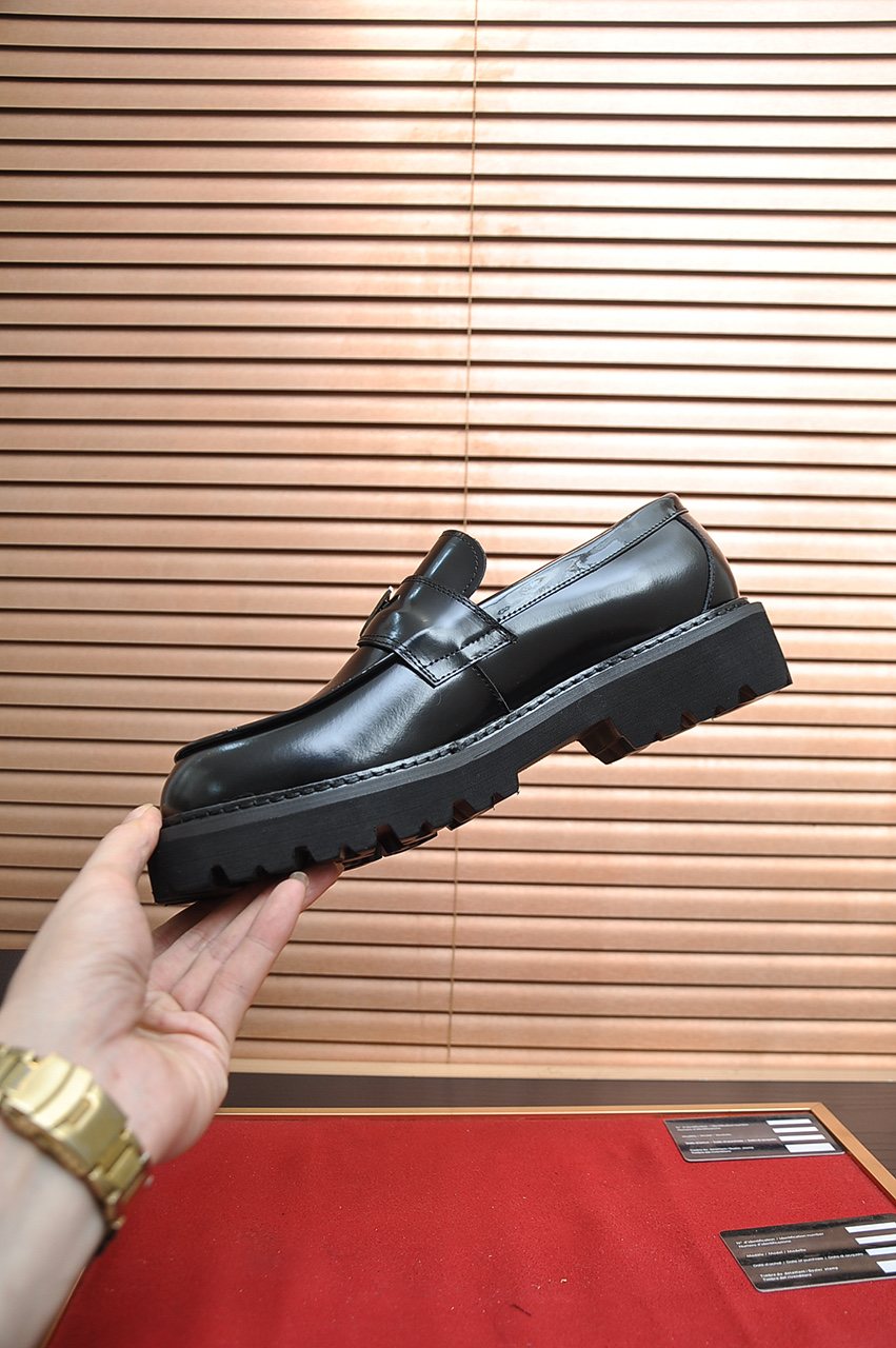 Prada Lug-Sole Strap Loafers — model