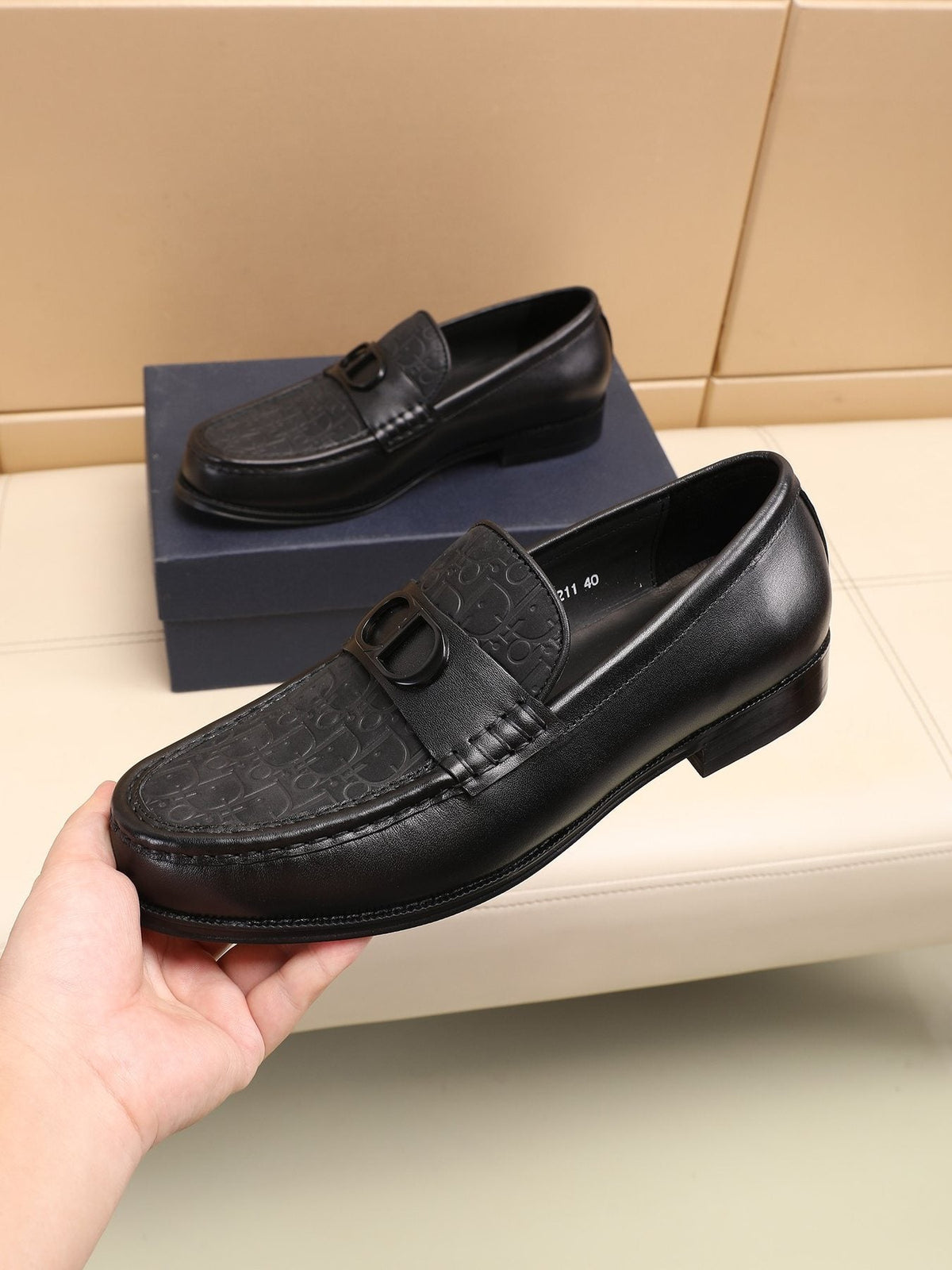 Dior Textured Buckle Loafers — model