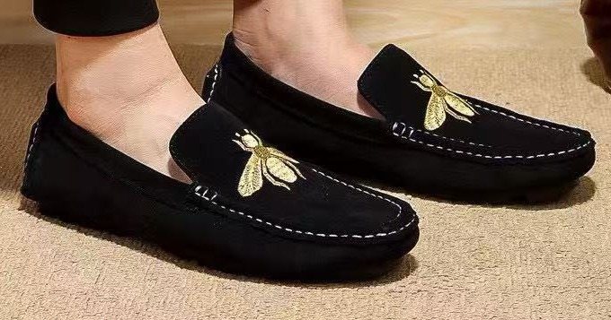 Gucci Black Bee-Embroidered Loafers — model