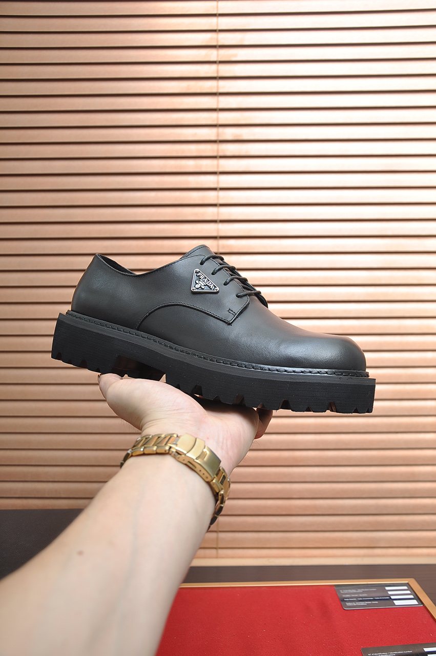 Prada Lug-Sole Lace-Up Derby Shoes — model