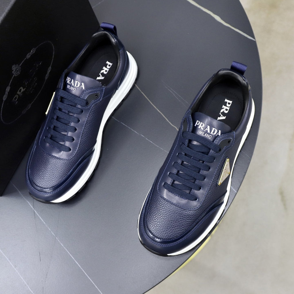 Prada Paneled Lace-Up Sneakers — front