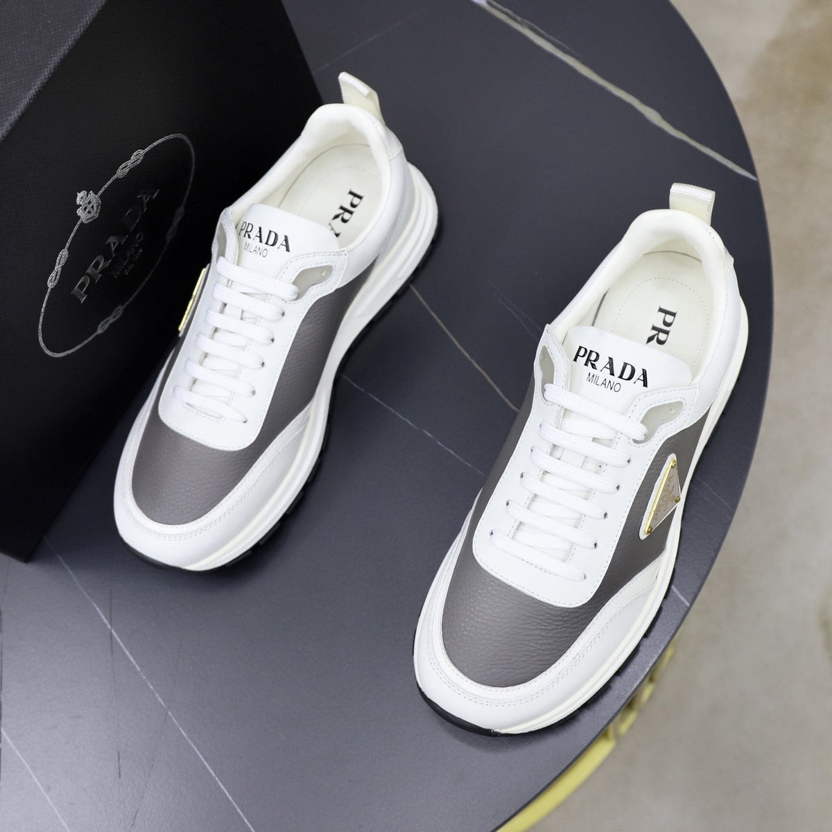 Prada Paneled Lace-Up Sneakers — front