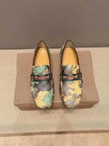 Gucci Patterned Metal-Accent Loafers — hero