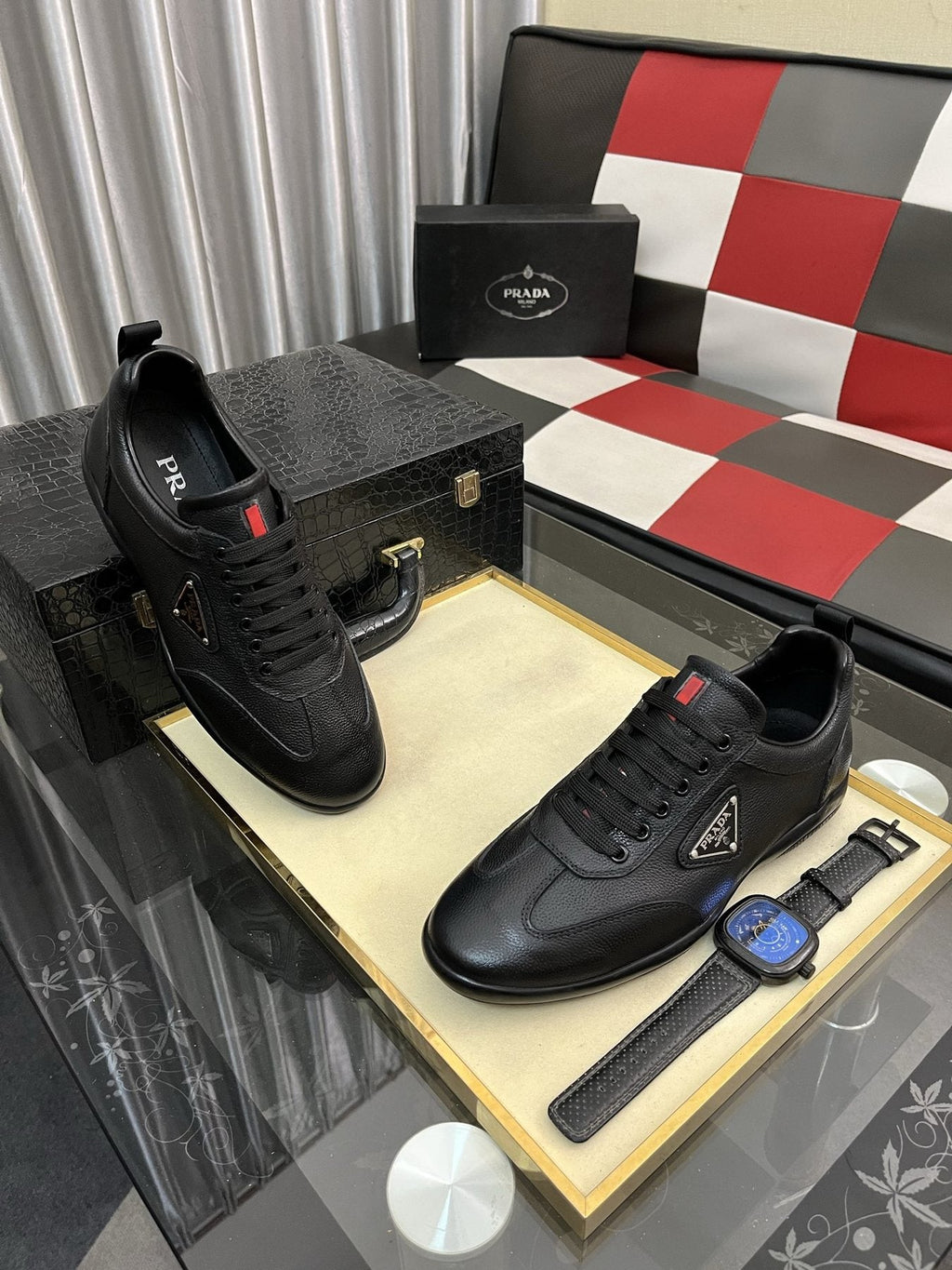 Prada Black Lace-Up Sneakers with Red Tab — front