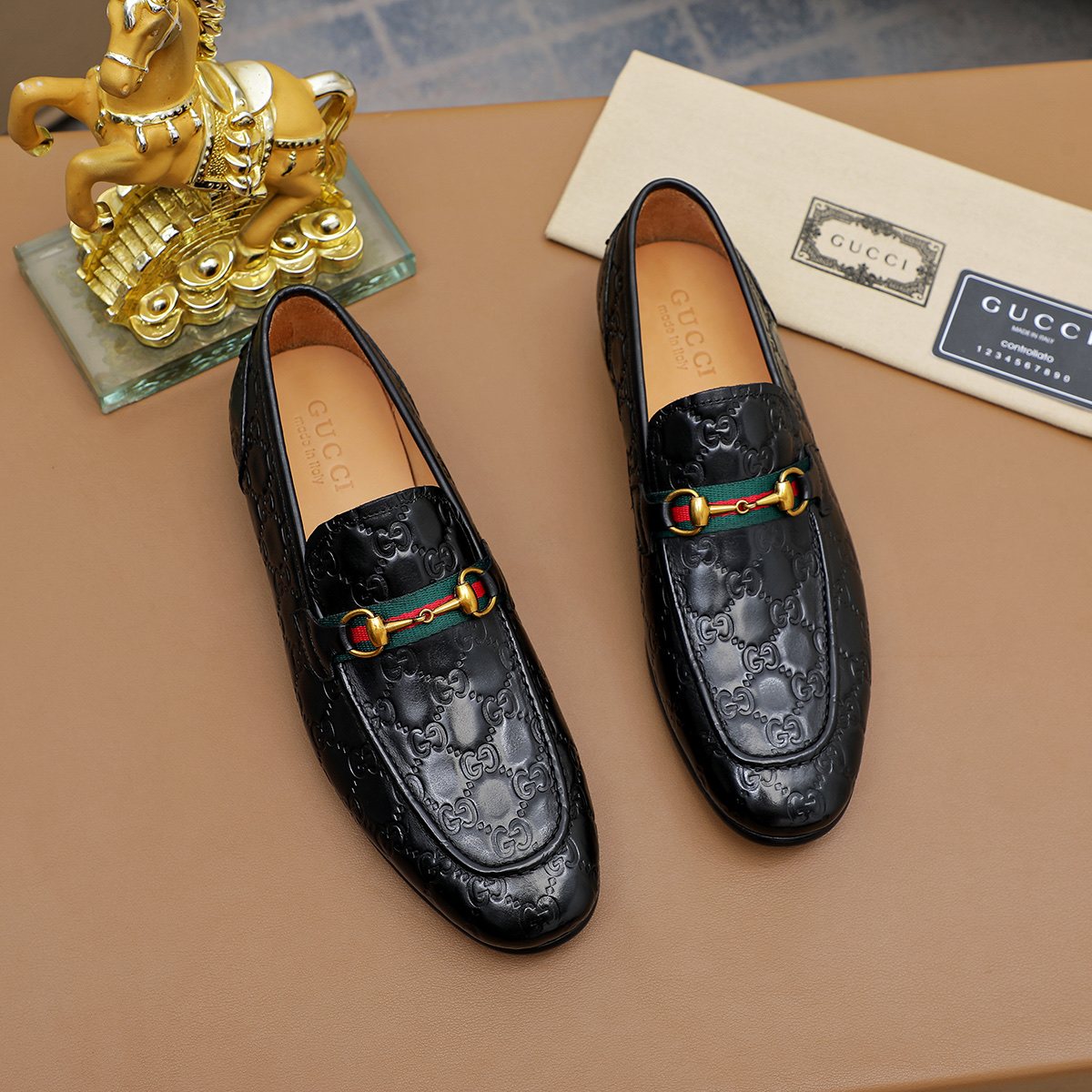 Gucci Patterned Metal-Bit Loafers — front