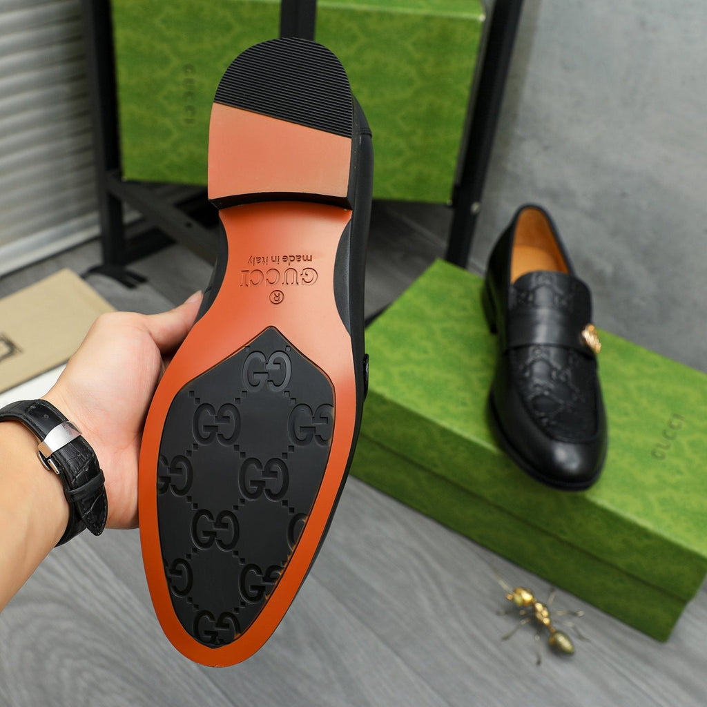Gucci Black Embossed Loafers with Gold-Tone Detail — detail
