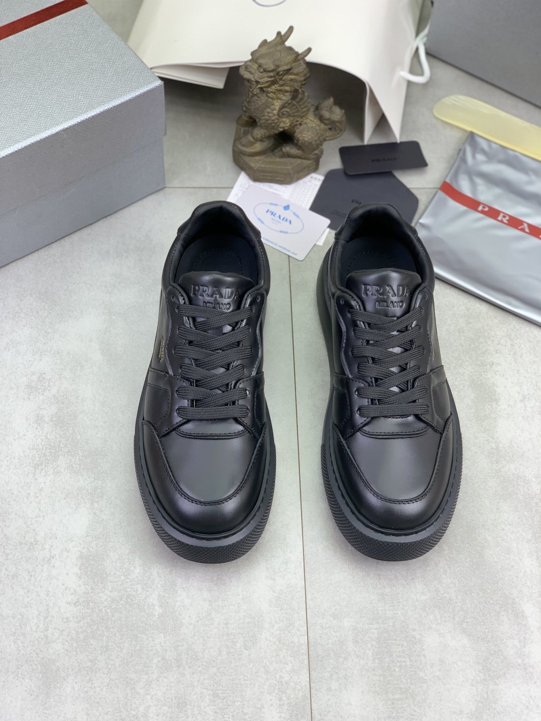 Prada Paneled Low-Top Sneakers — front
