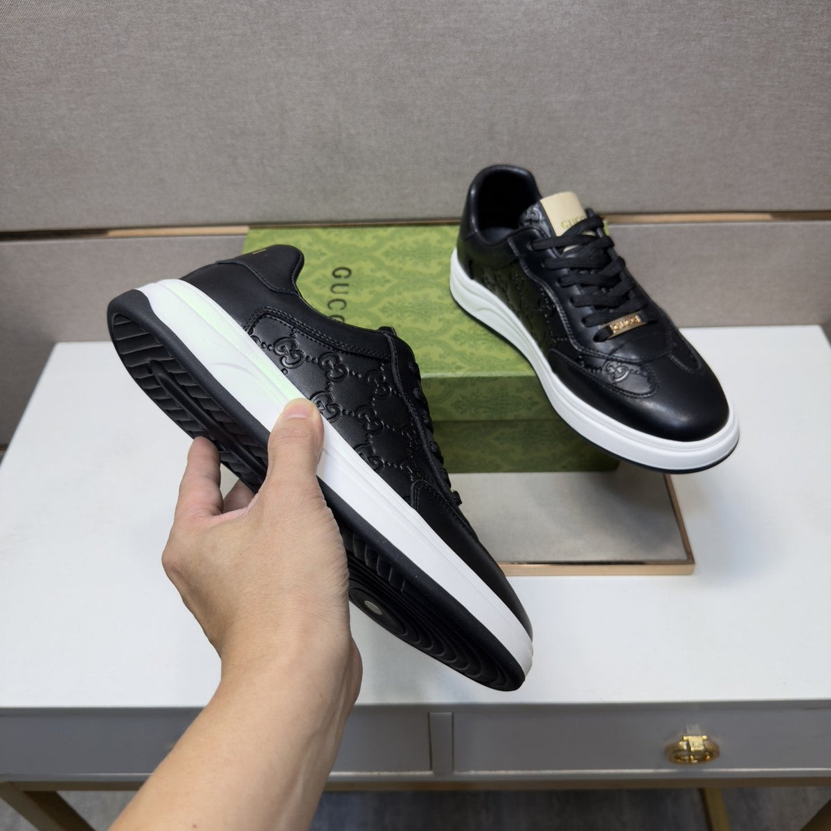 Gucci Men's Embossed Low-Top Sneakers — model