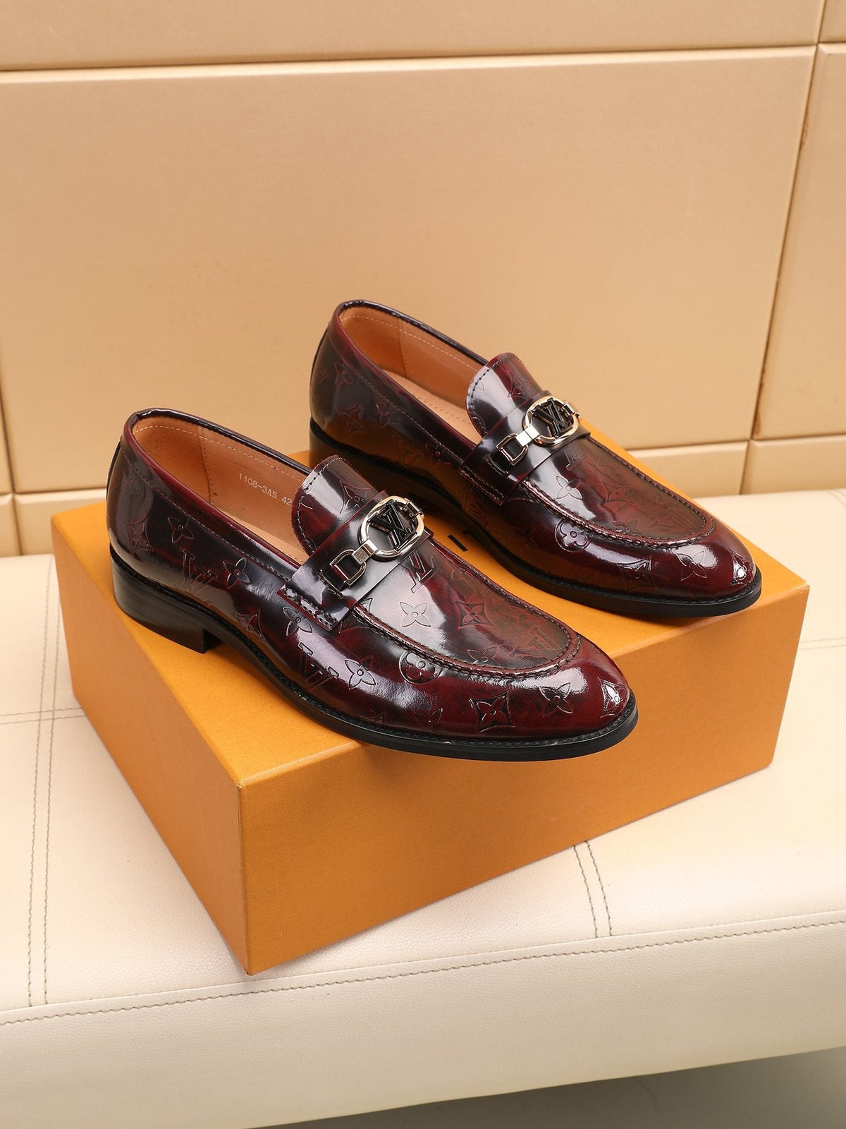 Louis Vuitton Embossed Bit Loafers — front