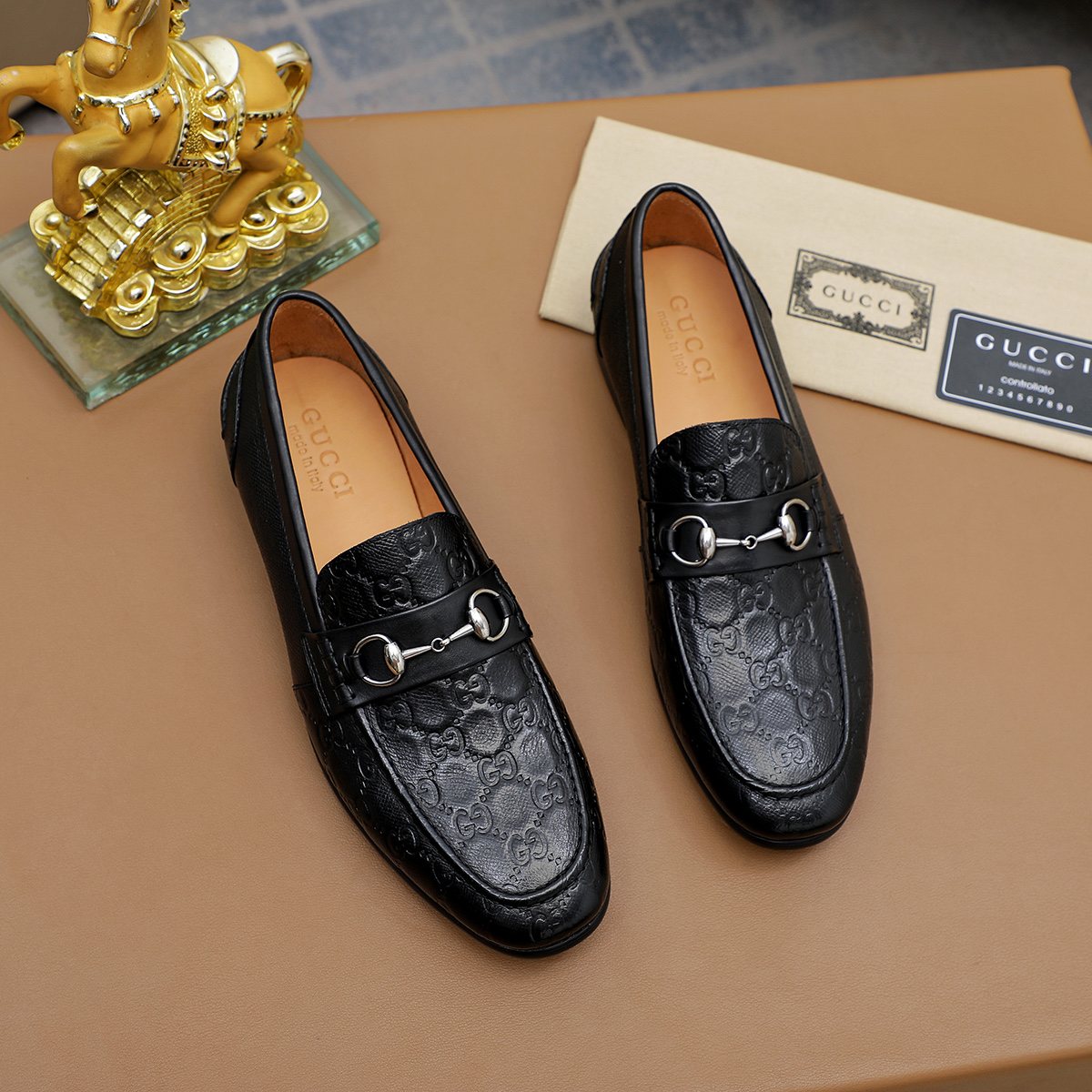 Gucci Black Embossed Loafers — front