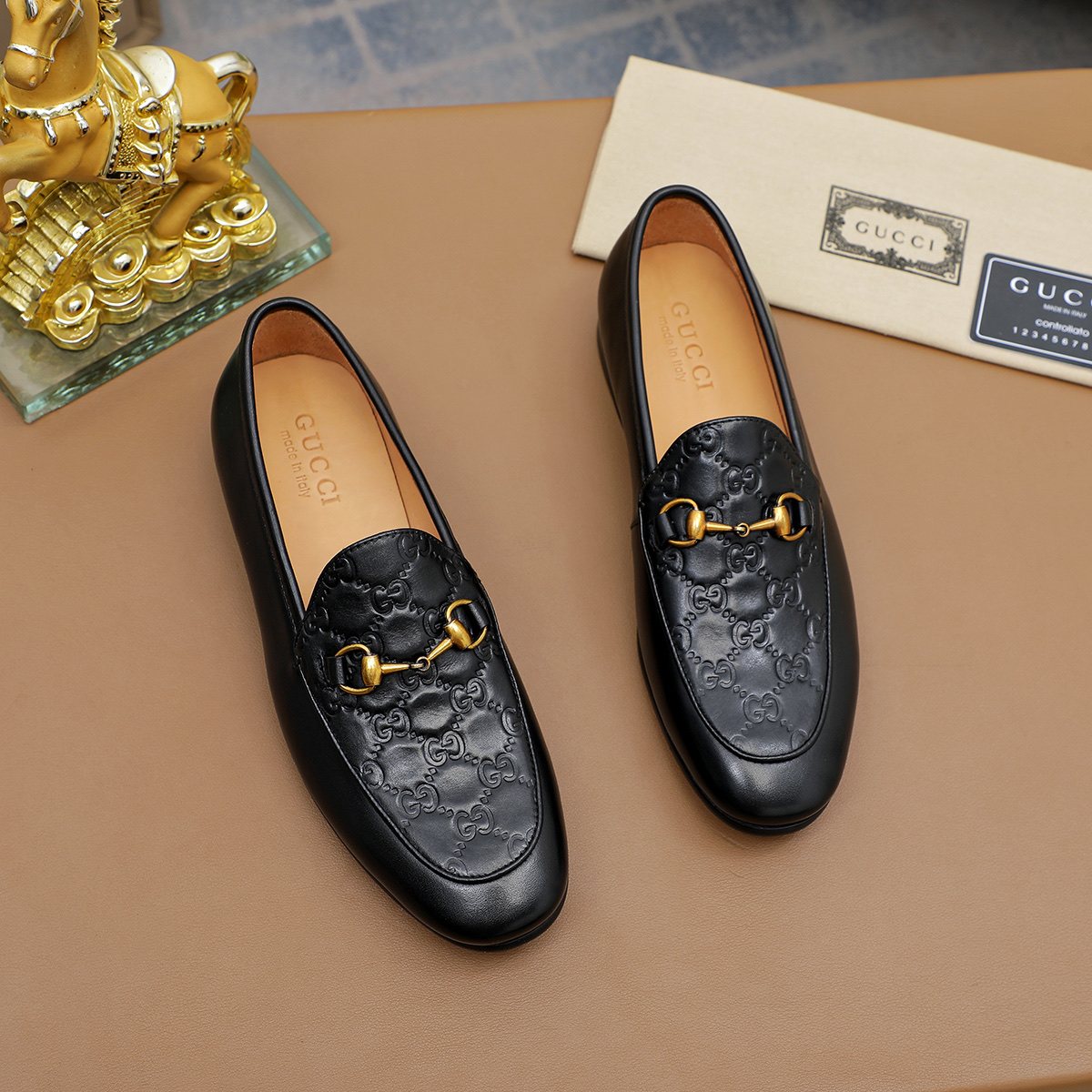 Gucci Black Embossed Loafers — front