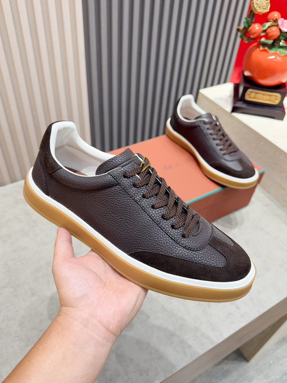 Paneled Low-Top Lace-Up Sneakers — model