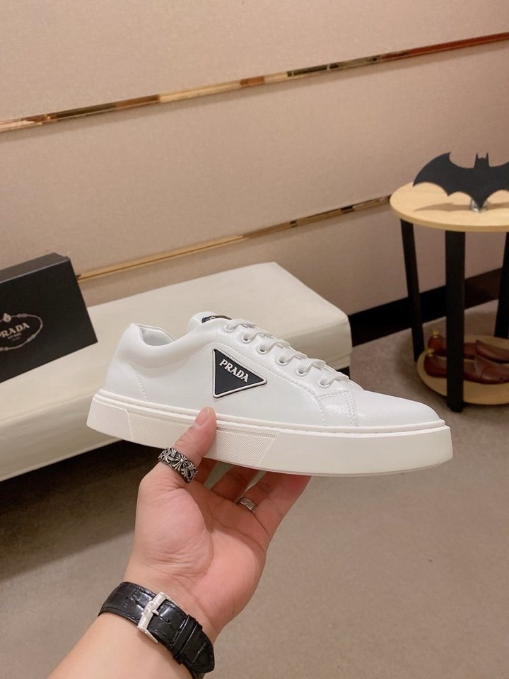 Prada Plaque Low-Top Sneakers — model