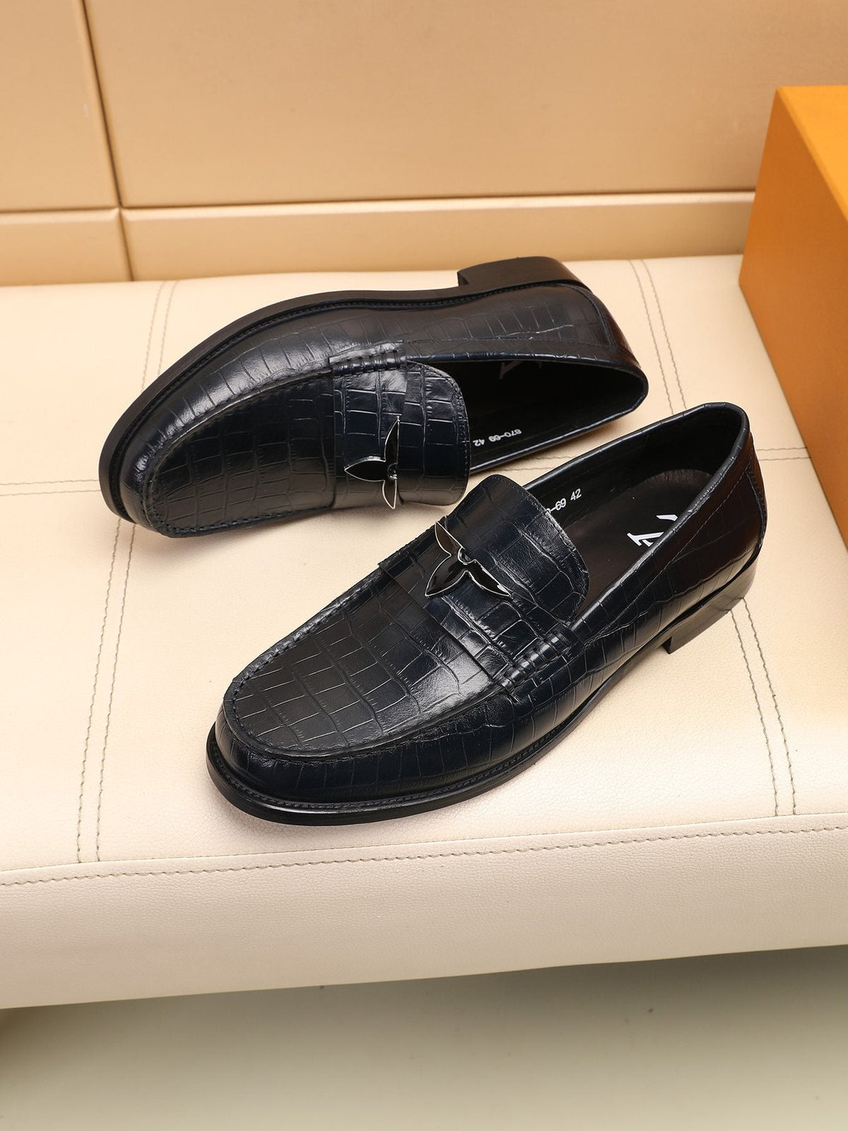 Louis Vuitton Embossed Strap Loafers — front